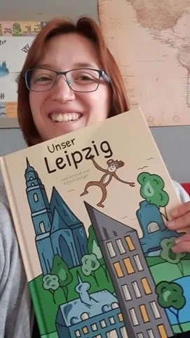 Jane Schmidt mit dem Buch "Unser Leipzig".